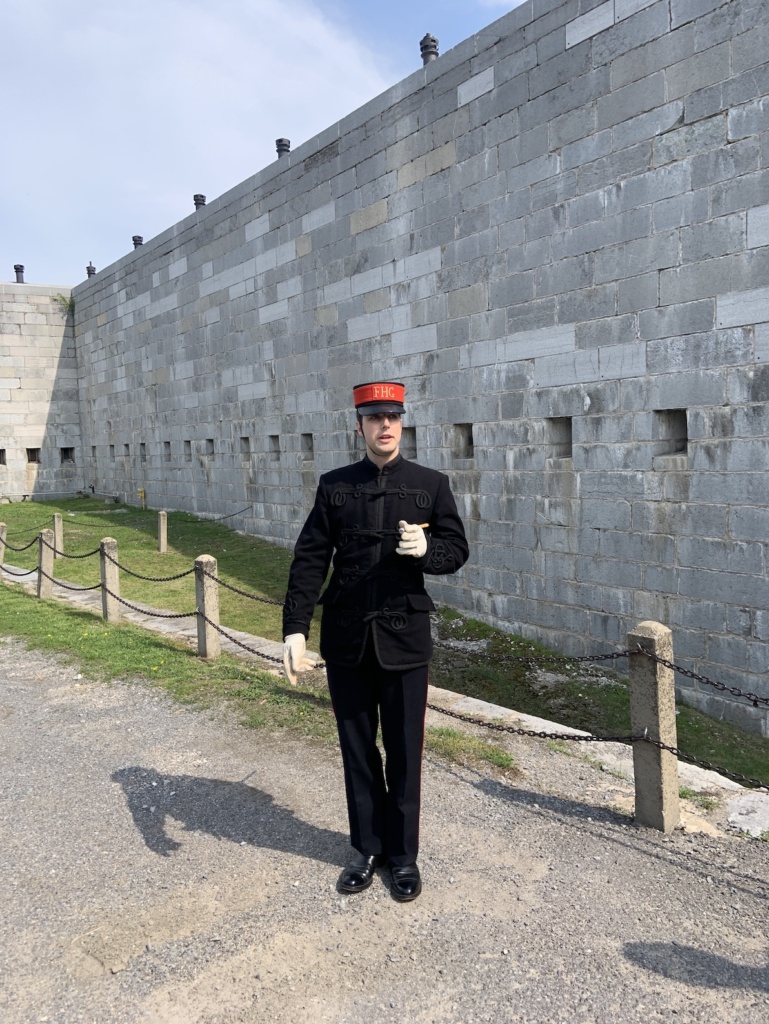Officer explaining Fort Henry's defences.